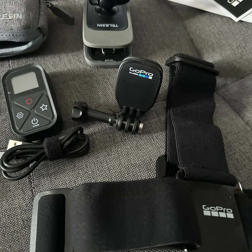 Go Pro 11 black camera with 12 piece accessories. - Picture 8 of 12